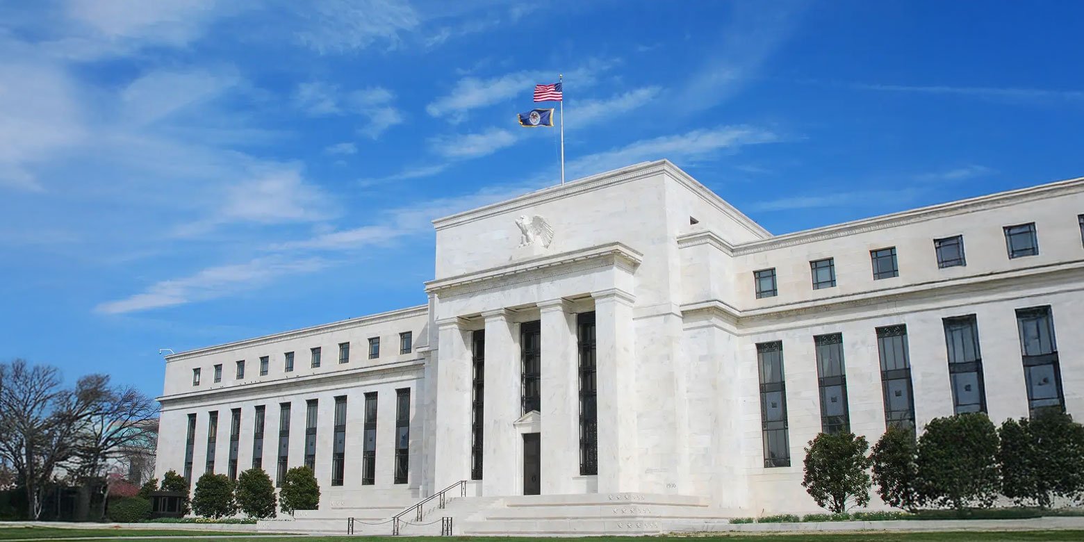 The federal reserve building on a sunny day