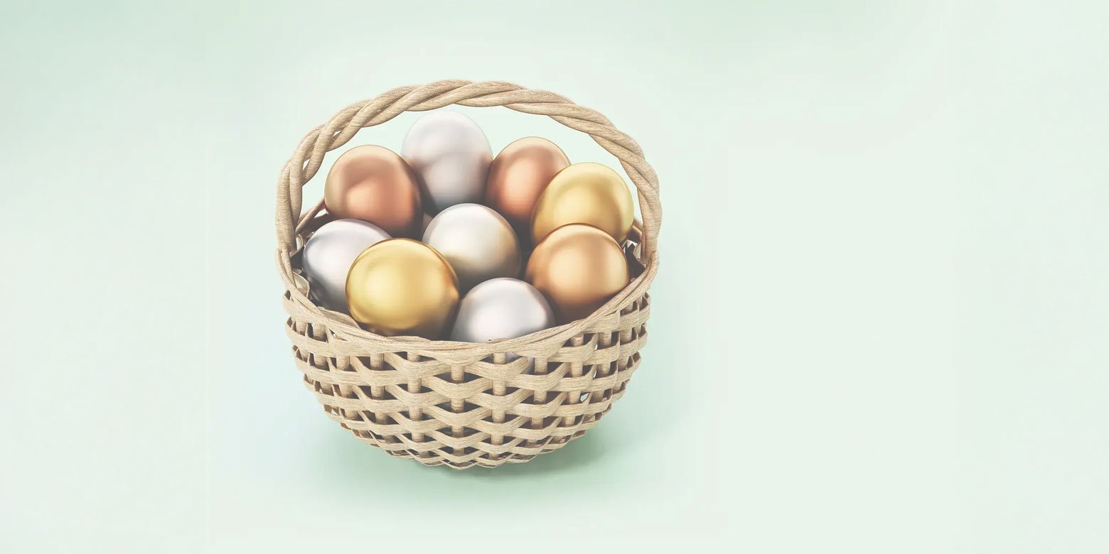 Various colored eggs in a basket