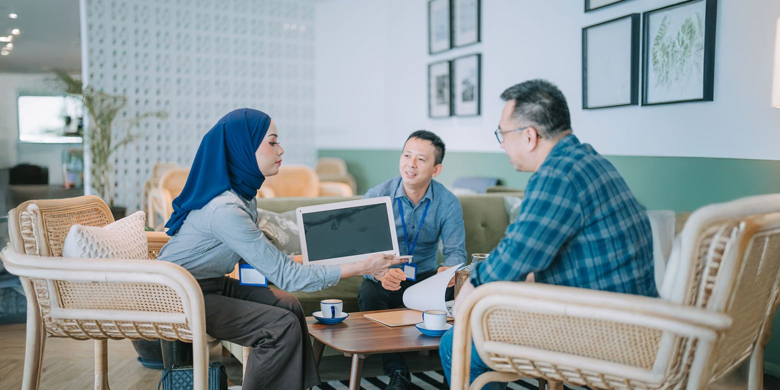 A financial advisor walks a family through a possible trust.