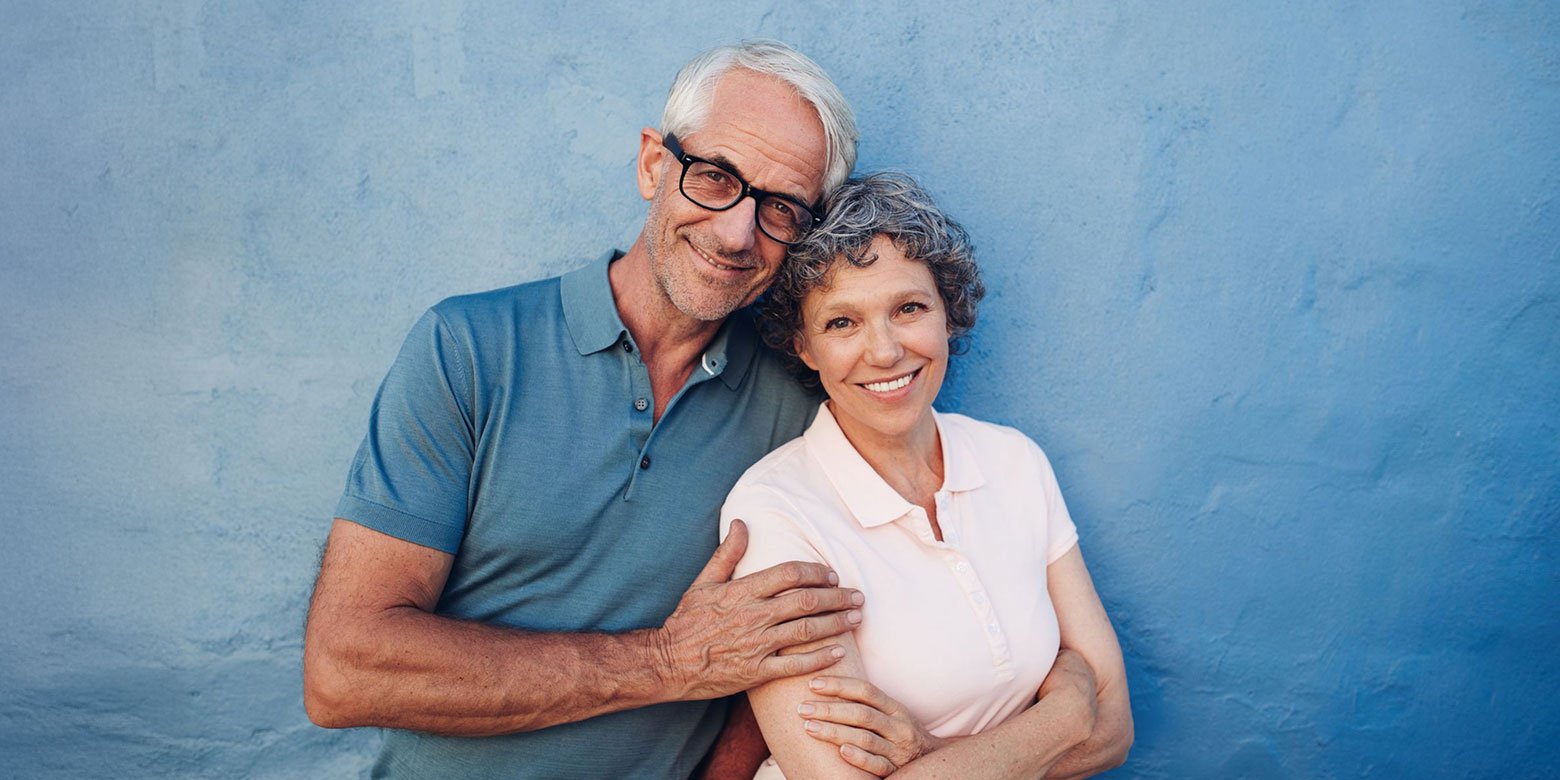 Older couple posing for a photo