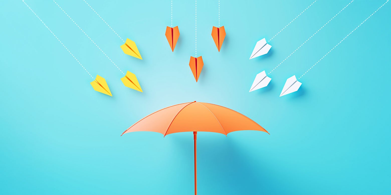 Open umbrella shield off paper airplanes